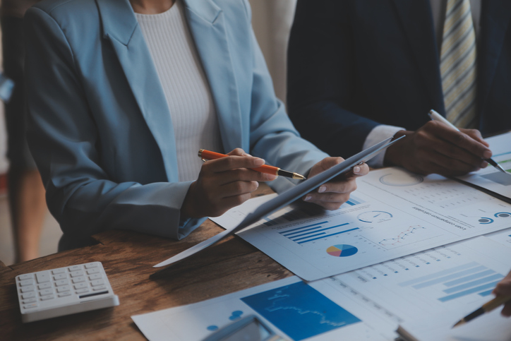Co working conference, Business team meeting present, investor colleagues discussing new plan financial graph data on office table with laptop and digital tablet, Finance, accounting, investment